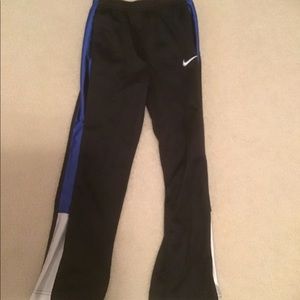 Black, blue and white nike pants